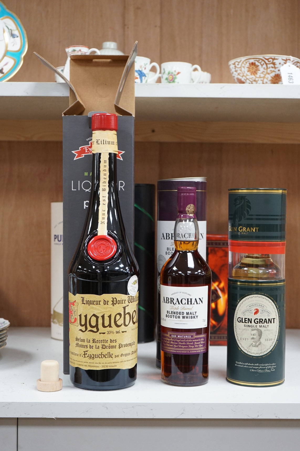 Six bottles of whisky to include Liqueur de Poire, Glenfiddich and Dimple